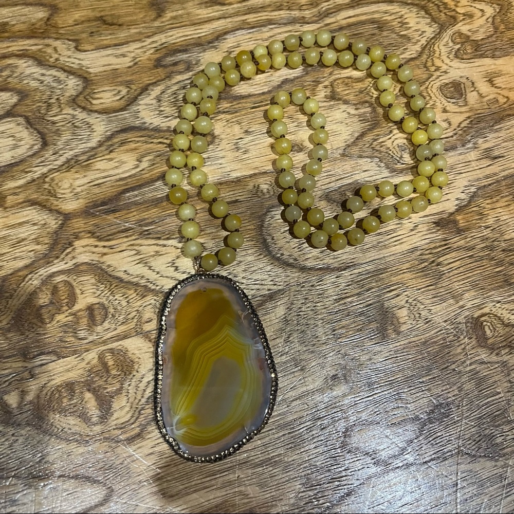 New yellow beaded long necklace. Huge yellow translucent marbled slab pendant.